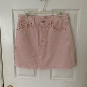 Pink Levi’s mini skirt
